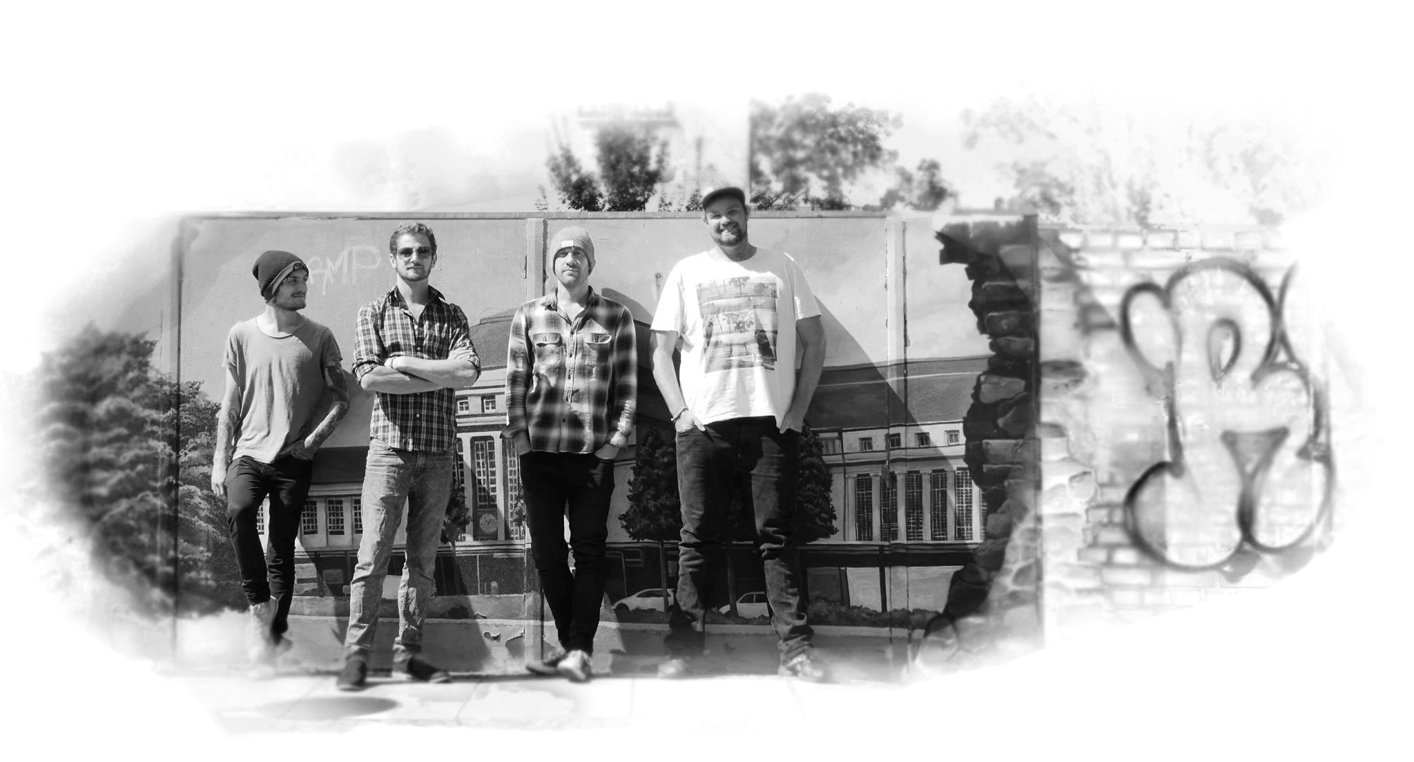 British indie-pop/indie-rock band, OJ On The Run, standing in front of graffiti in Leipzig